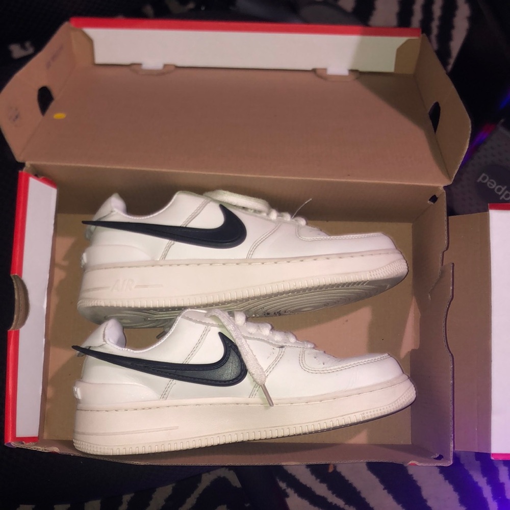 Nike White Sneakers with Black Swoosh